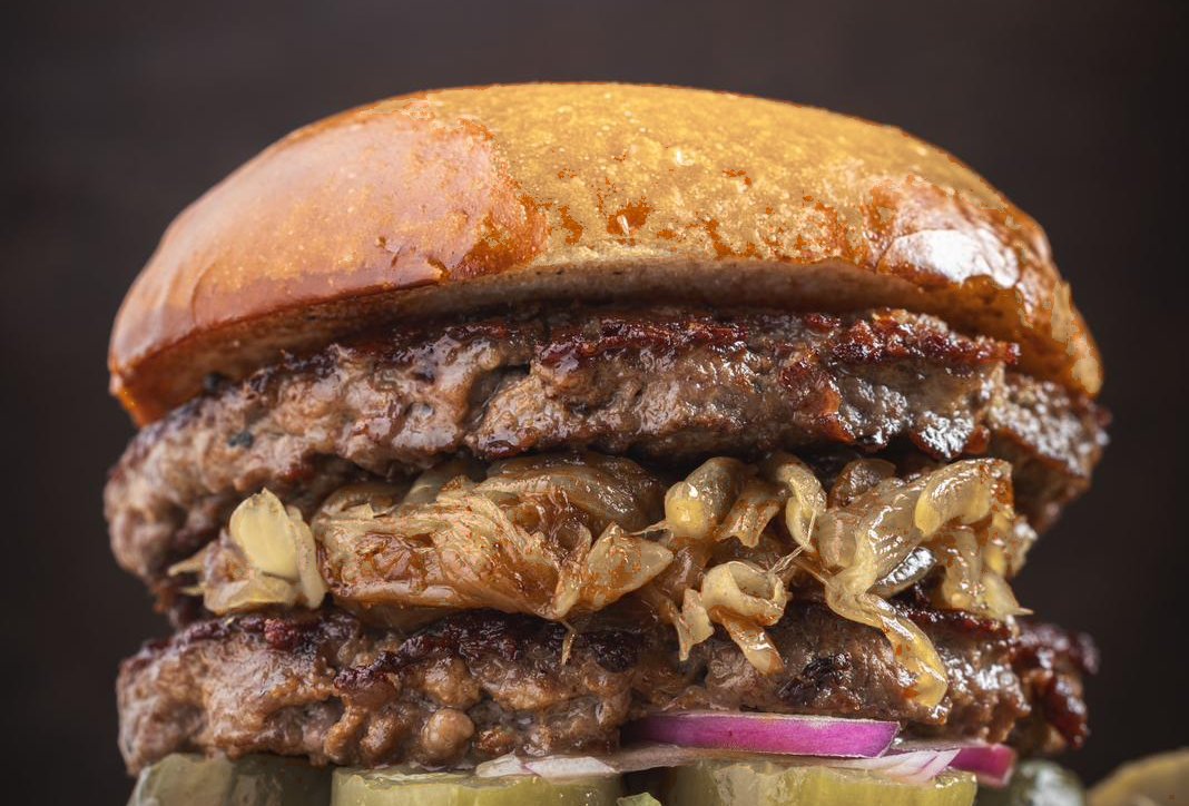 Double burger with sautéed onions at Shimmy's Bar & Grill